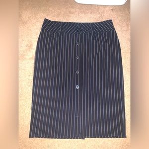 Women’s black pencil skirt with light blue and tan stripes. Size small
